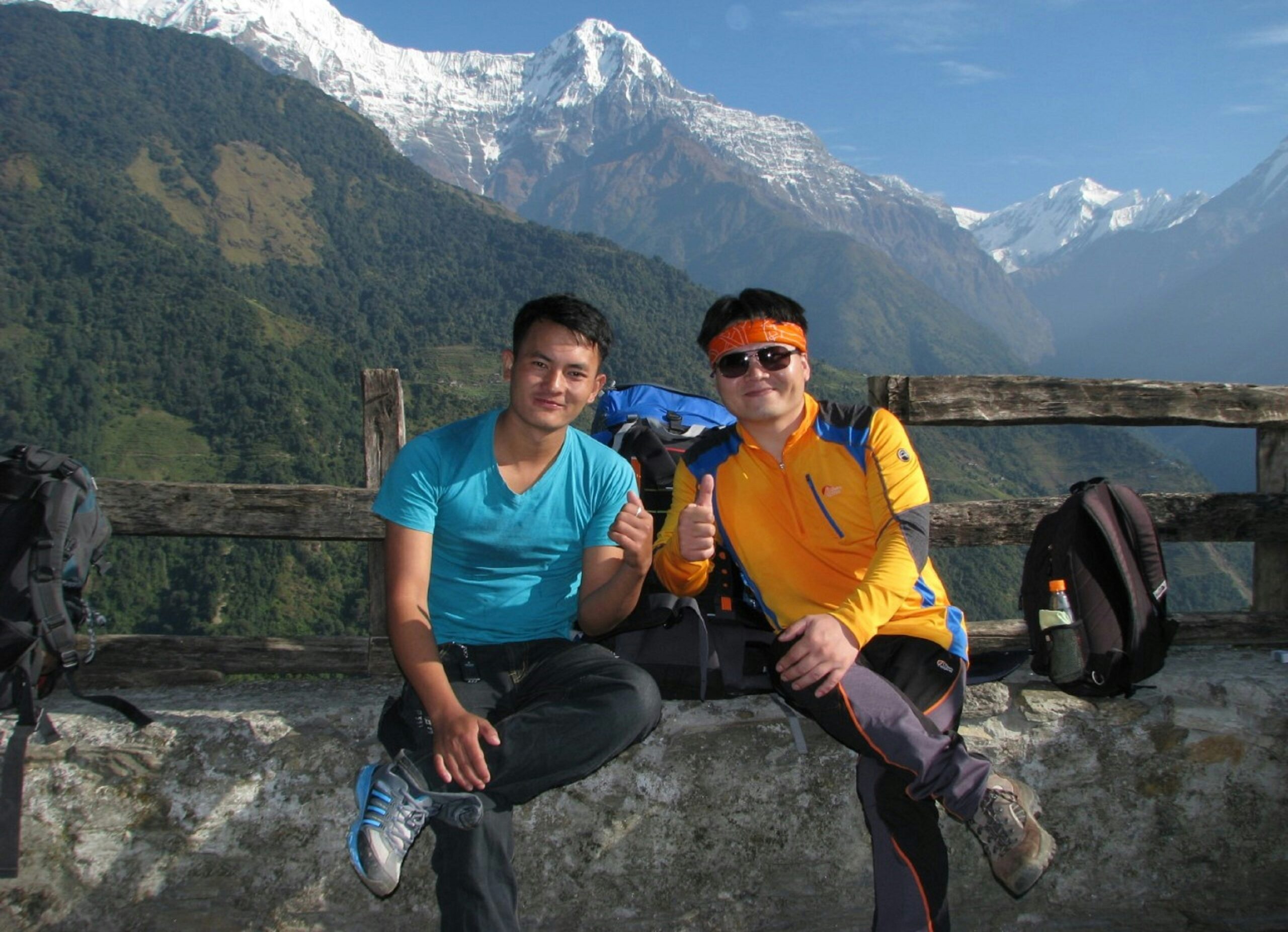 Happy tourists posing with well-maintained ebikes during a scenic tour