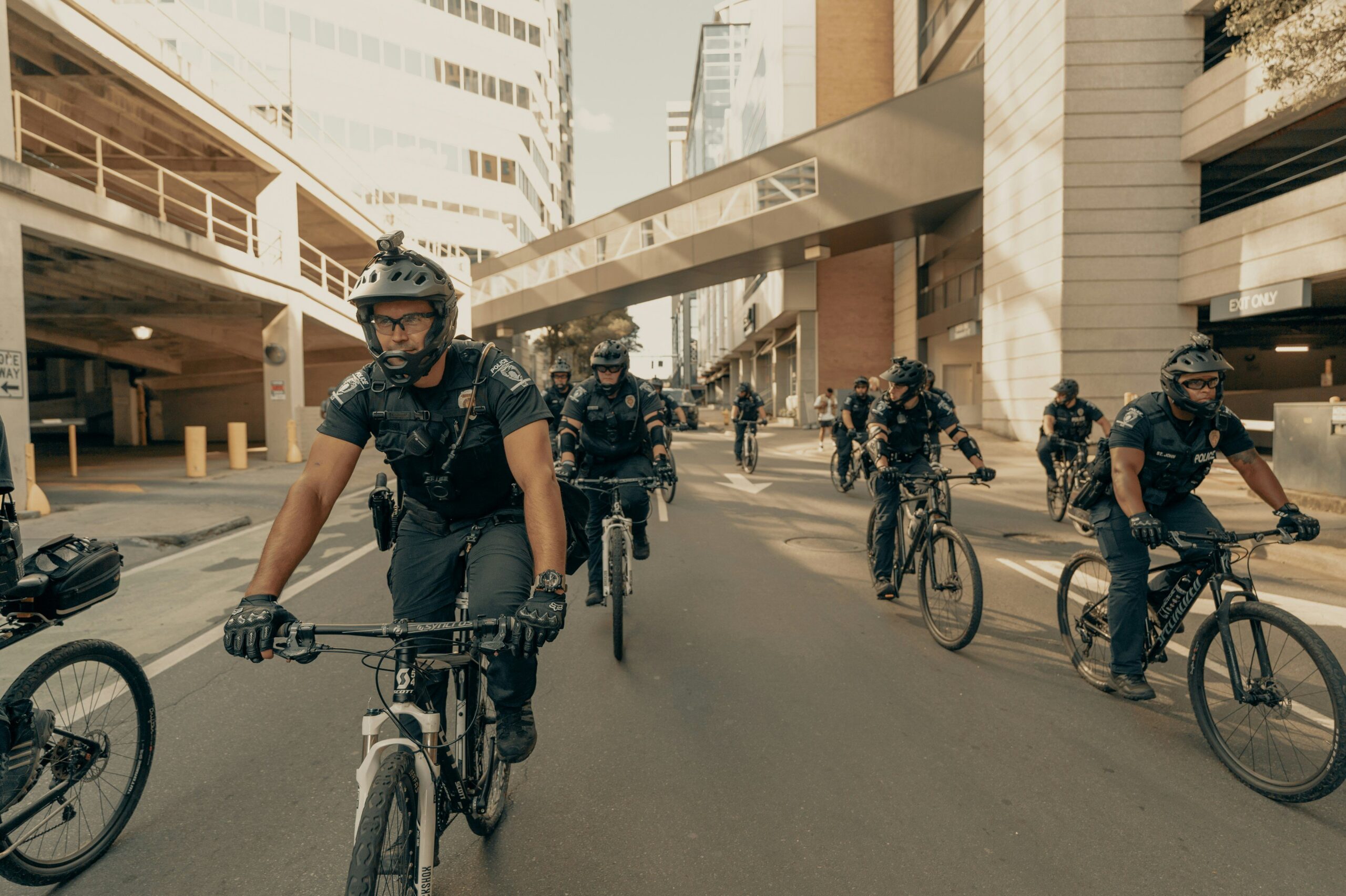 A group of cyclists enjoying an urban bike adventure through vibrant city streets.