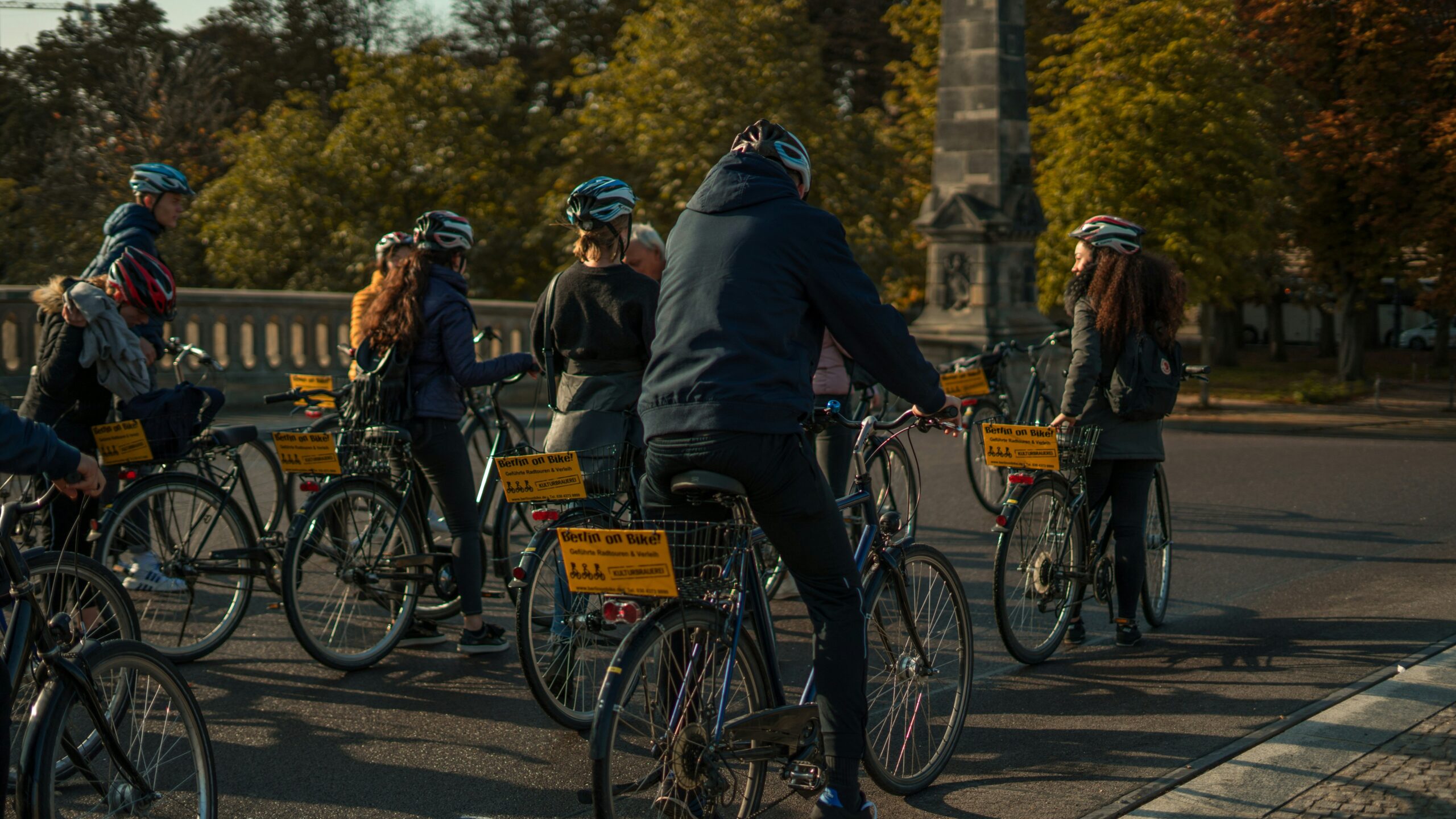 An eBike preparation kit with tools, snacks, water bottles, and safety gear laid out neatly.