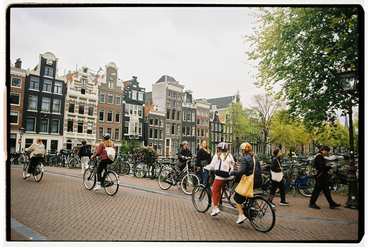 Photo of a cyclist wearing reflective jacket and helmet