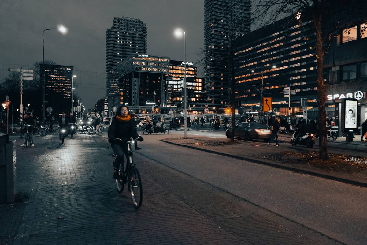 A person riding an ebike along a scenic hill path